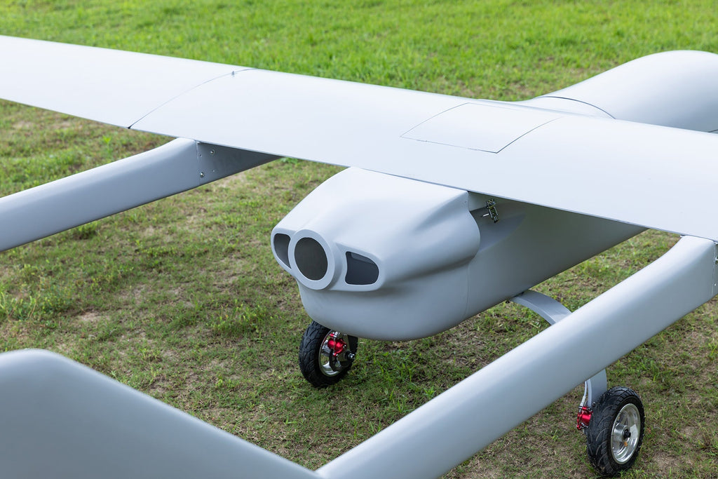 Skyeye UAV Fixed Wing Drone with 6000mm wingspan on grass.