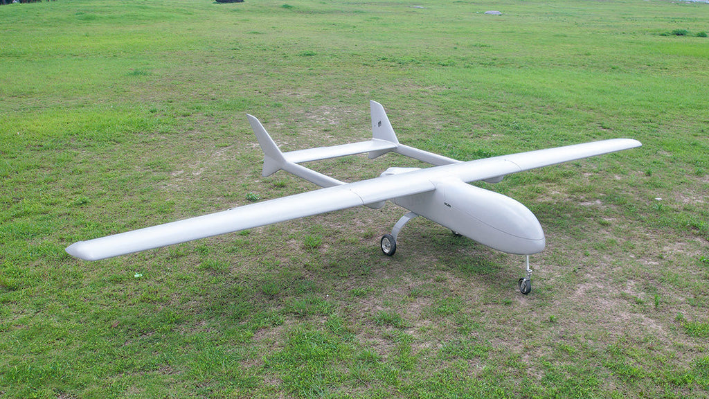 Skyeye 5000mm Carbon fiber fixed wing UAV Drone on grassy field.