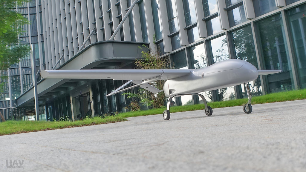 Skyeye Glass fiber 3220mm UAV Fixed Wing Drone in front of modern building.