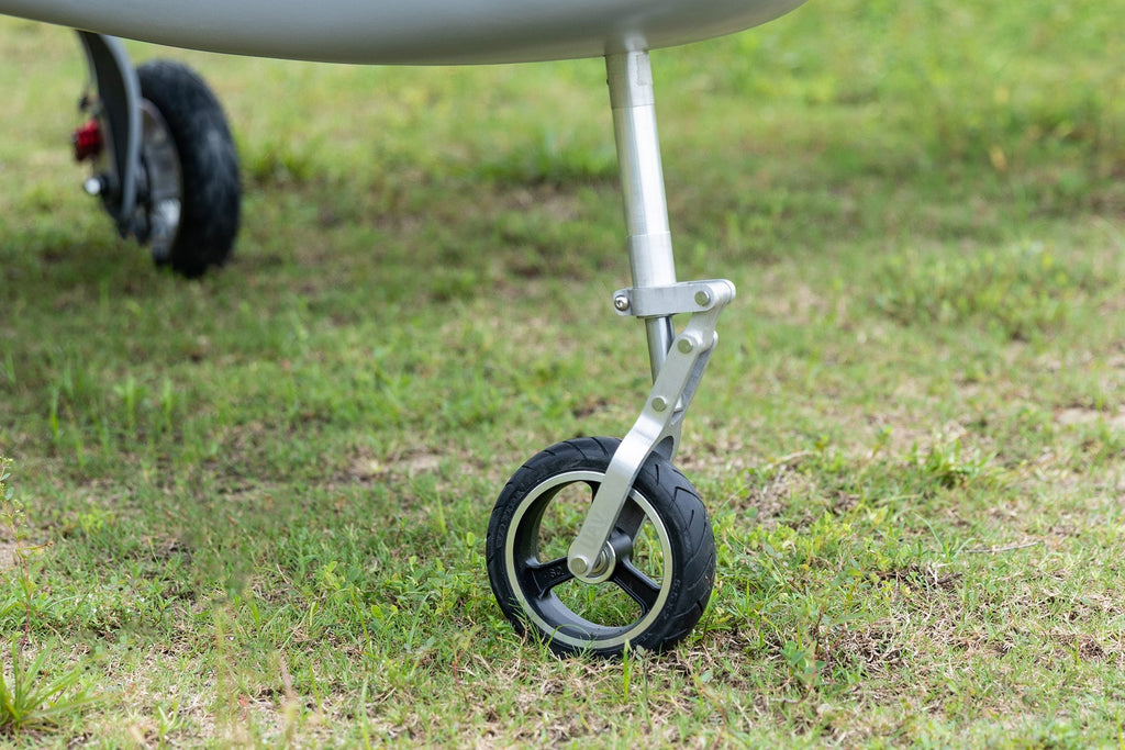 Skyeye Carbon fiber 6000mm UAV Fixed Wing Drone landing gear on grass.