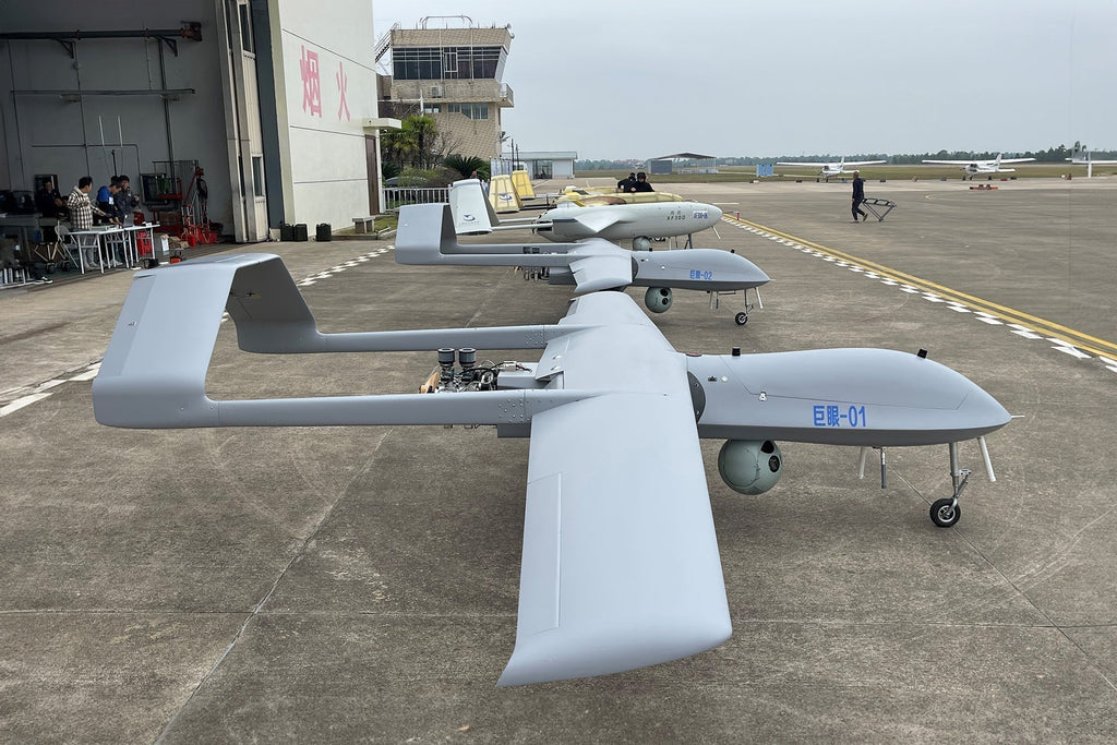Skyeye Giant Eye 6050mm Fixed Wing Drone SG605 on runway, showcasing large carbon fiber wingspan and aerodynamic design for efficient long-distance missions.